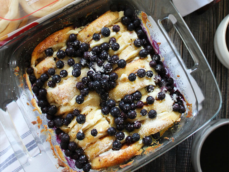 BAYS AND BERRIES STACKED IN A CASSEROLE DISH