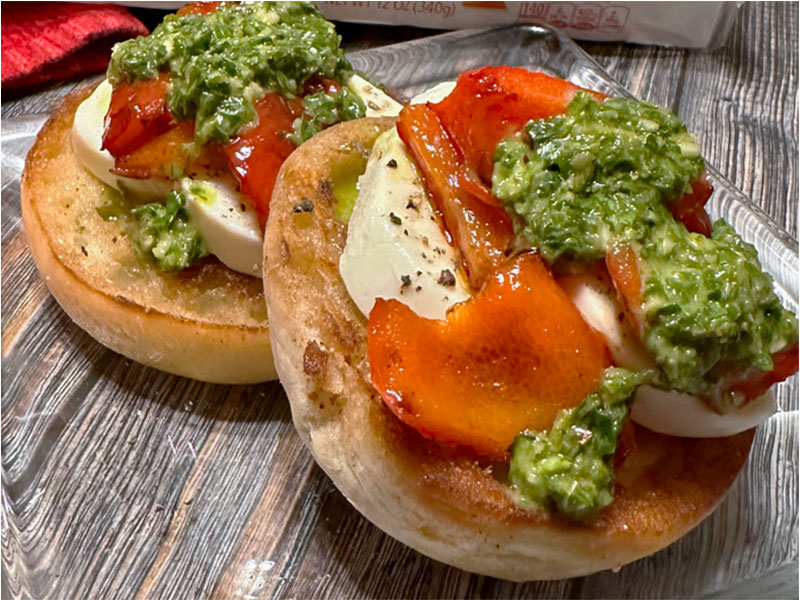 BAYS TOPPED WITH MOZZARELLA TOMATO AND PESTO
