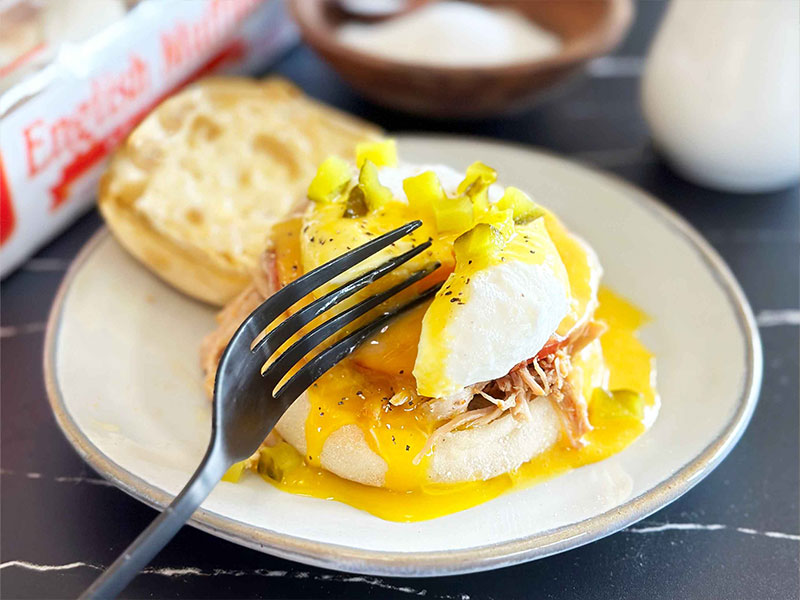 bays with for cutting into a poached egg topped with pickles