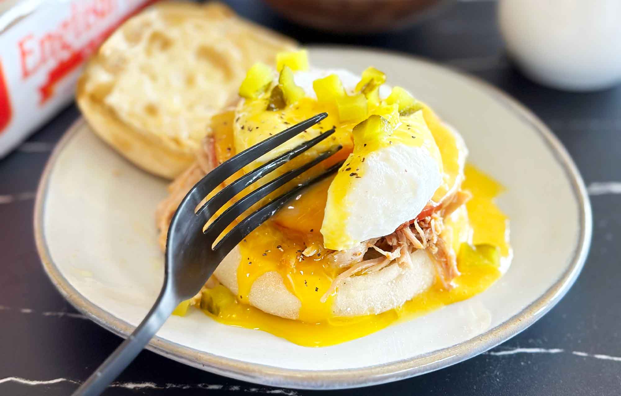 bays with for cutting into a poached egg topped with pickles