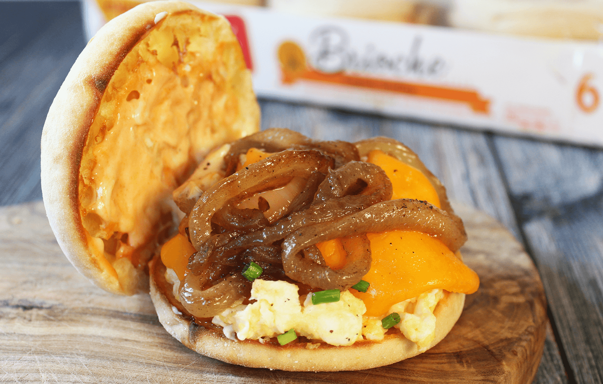 BAYS WITH EGG CHEESE AND CARMELIZED ONIONS