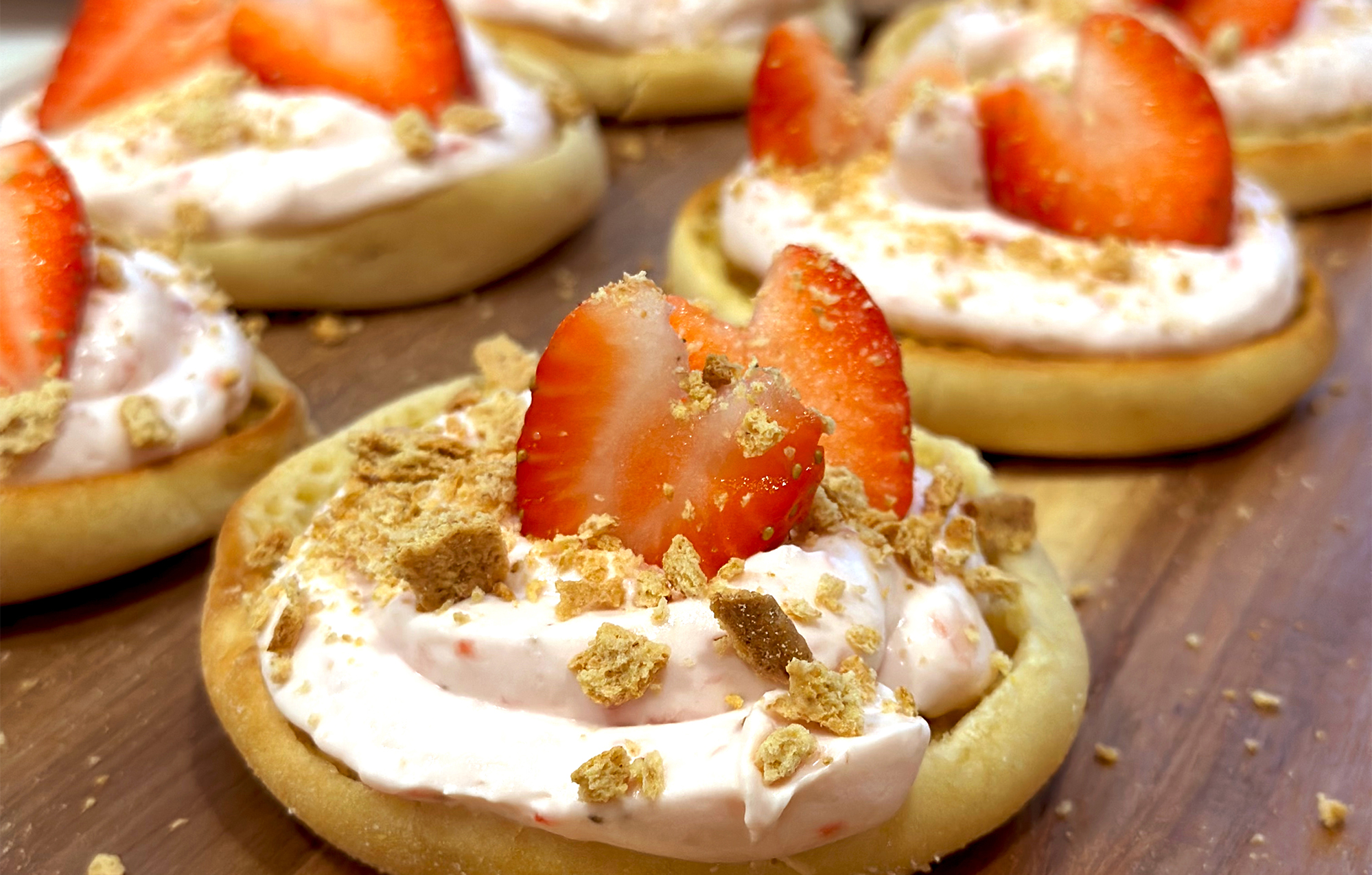 BAYS WITH FRUIT HEARTS AND PINK CREAM TOPPING