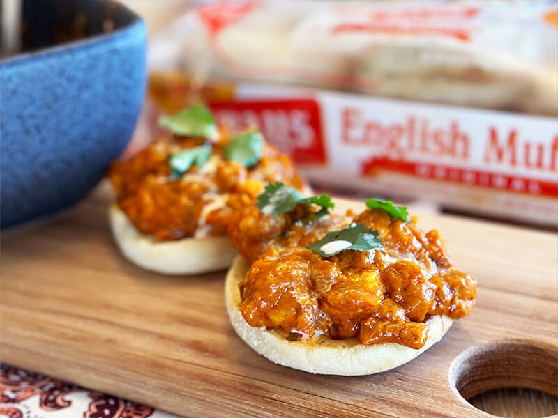 COATED CHICKEN PILED ON TWO BAYS ENGLISH MUFFINS