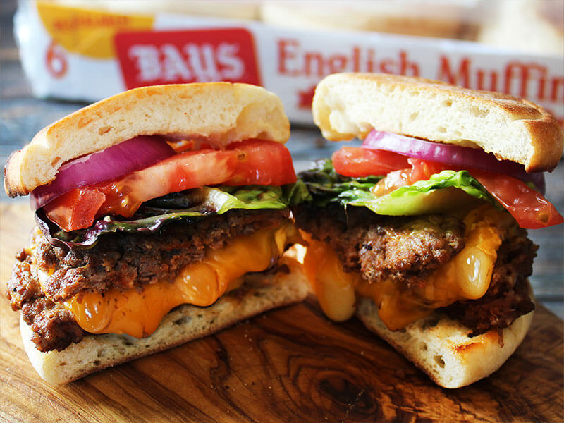 HUGE BURGER WITH CHEESE BETWEEN THE PATTIES
