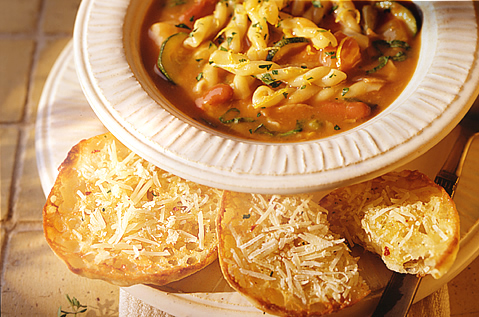 A RICH RED SOUP WITH TOASTED ENGLISH MUFFIN ON THE SIDE