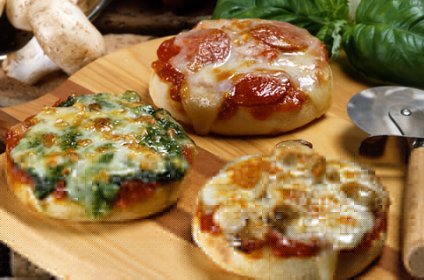 three personalized Bays English Muffins with tomato sauce and cheese