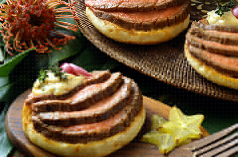 medium rare beef gently placed on Bays English Muffins