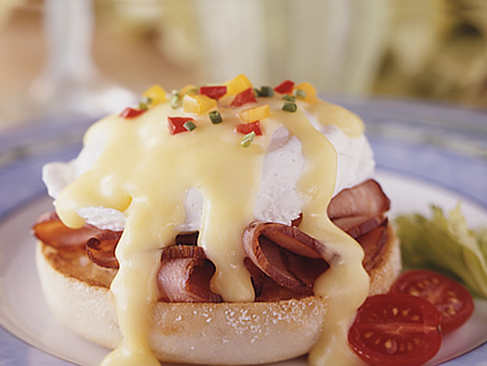 poached egg and ham with hollandaise sauce on a Bays English Muffin