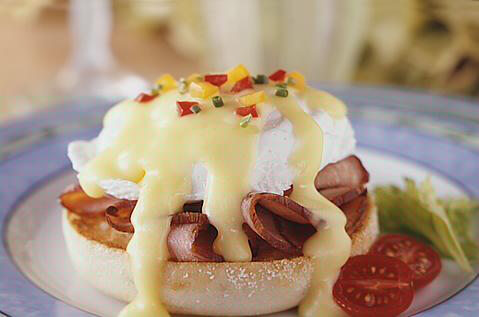 poached egg and ham with hollandaise sauce on a Bays English Muffin