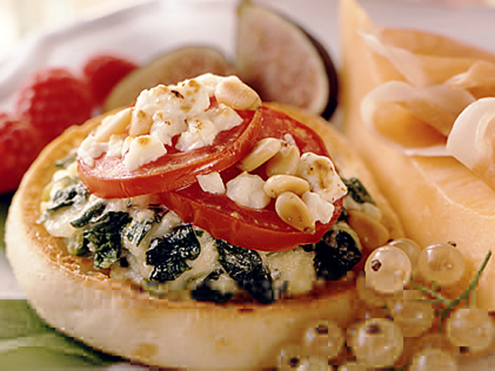 BAYS ENGLISH MUFFINS TOPPED WITH A COOKED SPINACH MIX, TOMATOES AND CHEESE