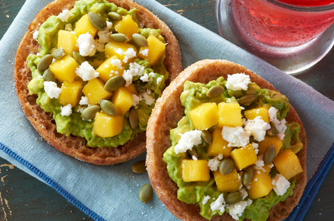 a green spread topped with fruit on Bays English Muffins