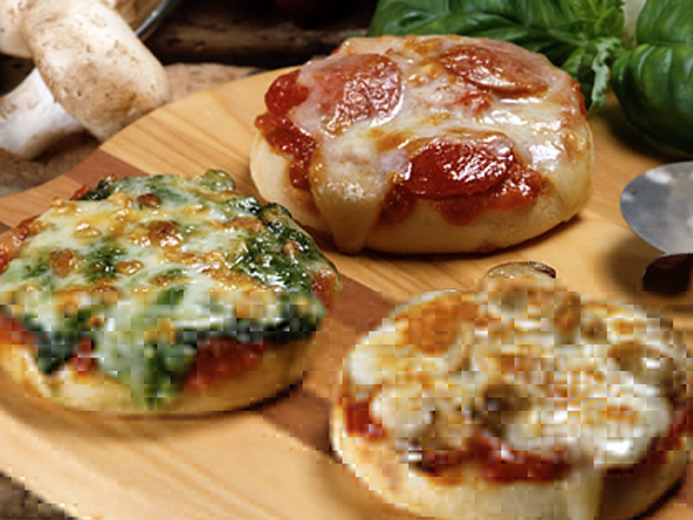 three personalized Bays English Muffins with tomato sauce and cheese