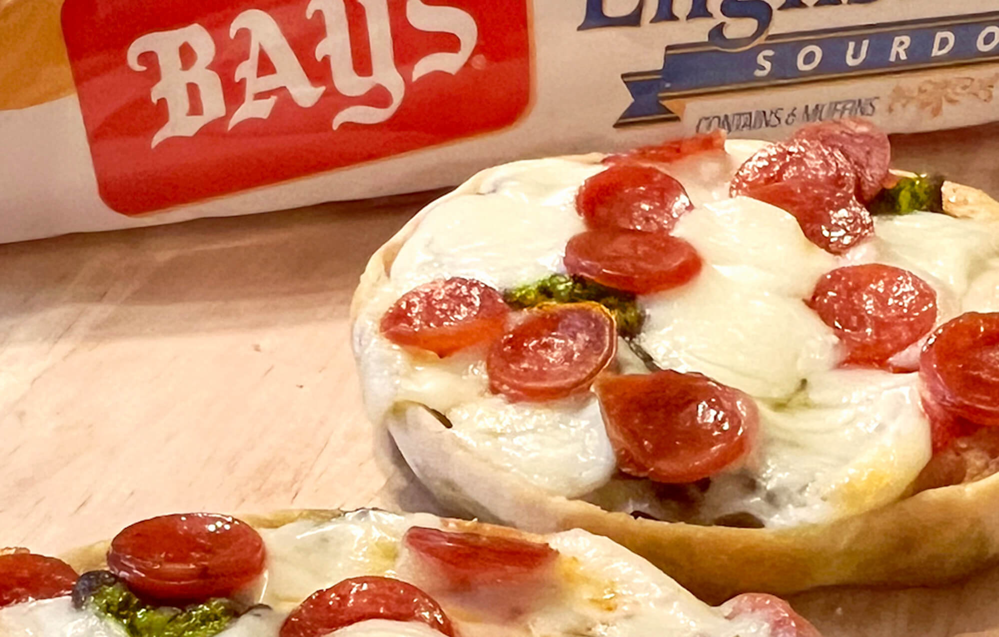 BAYS TOPPED WITH MEAT AND MELTY CHEESE