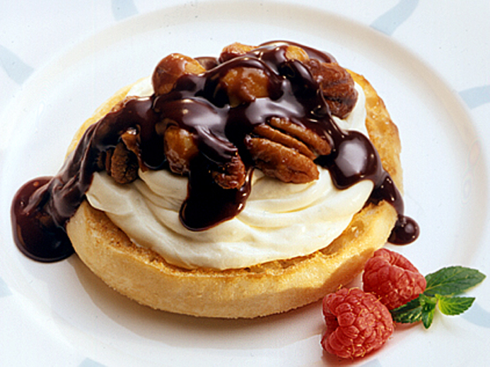BAYS TOPPED WITH MARSCAPONE PECANS AND CHOCOLATE SYRUP