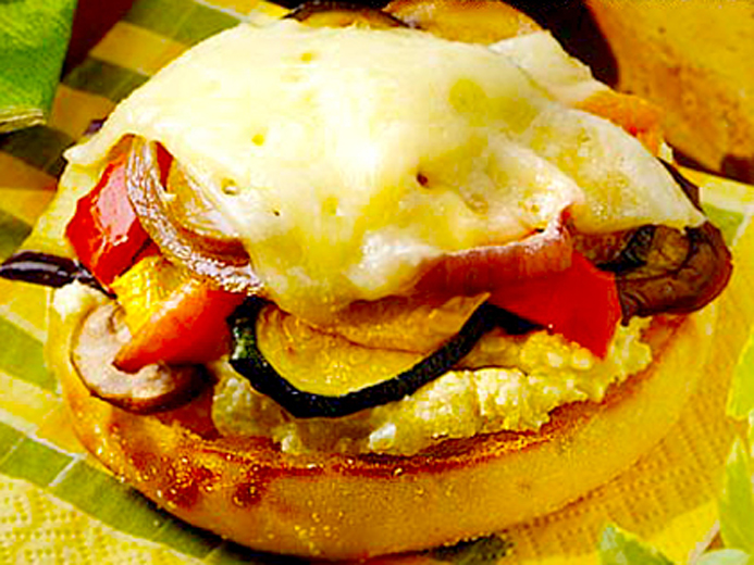 BAYS TOPPED WITH EGG VEGGIES AND MELTY CHEESE