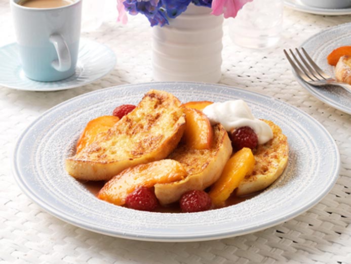 HALVED BAYS ON A PLATE WITH FRUIT