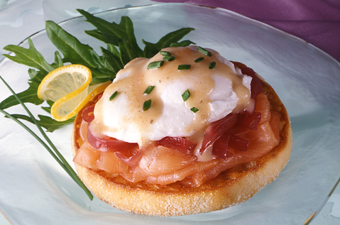 BAYS TOPPED WITH COOKED FISH, POACHED EGG AND HOLLANDAISE SAUCE