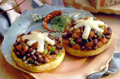 BAYS TOPPED WITH BLACK BEAN SALSA AND CHEESE