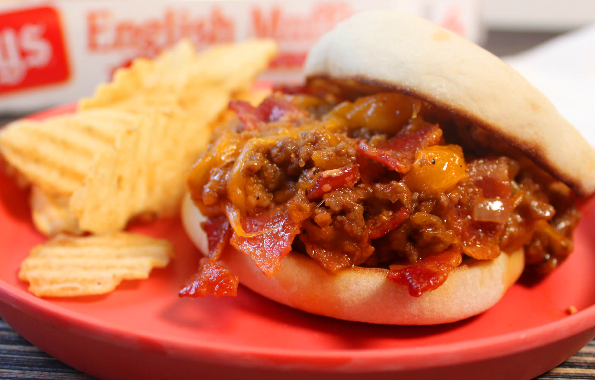 BAYS MIXED MEAT SANDWICH ON A RED PLATE WITH CHIPS