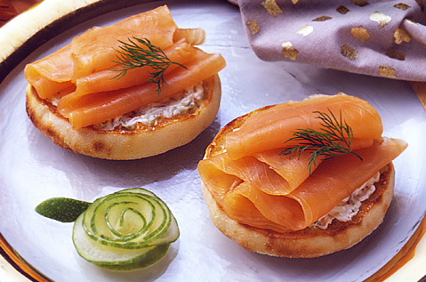 THIN STRIPS OF ORANGE FISH ON A BAYS ENGLISH MUFFIN