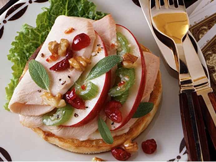 SLICED DELI MEAT WITH CRANDBERRIES AND WALNUTS ON BAYS ENGLISH MUFFINS